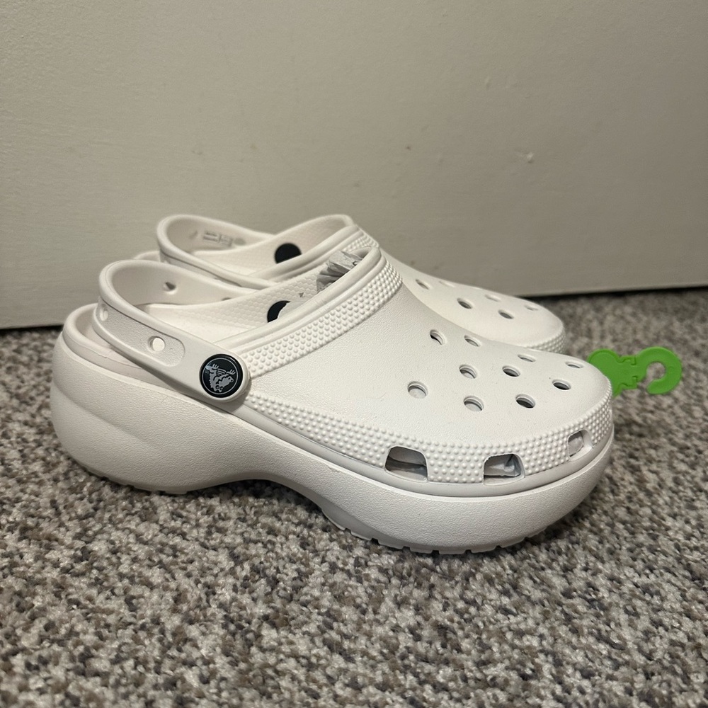 CROCS White Clogs with Green Tag
